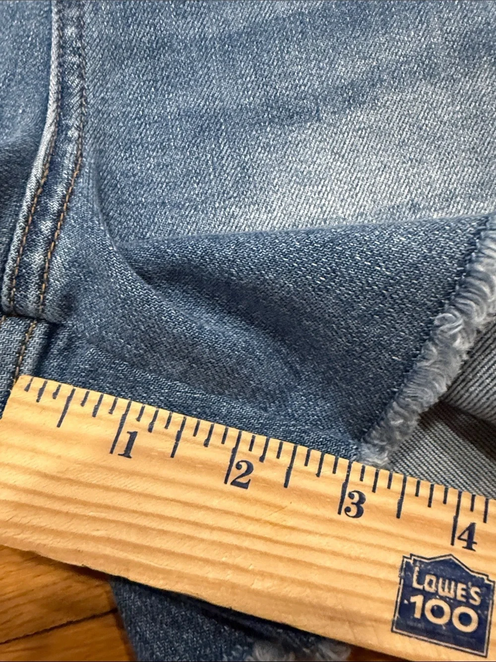 Judy Blue high waisted mild distressed raw hem jeans shorts size large .